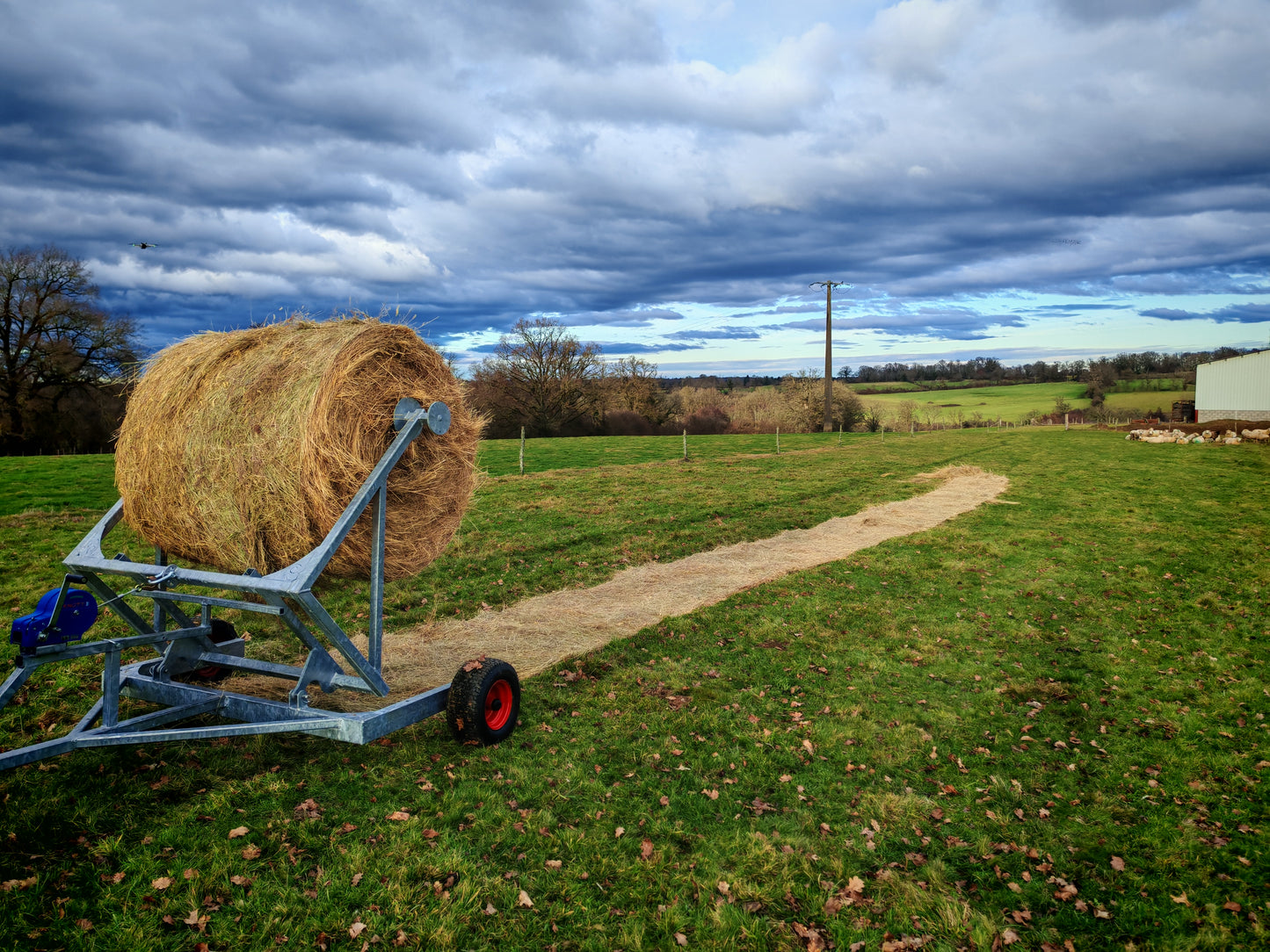 Transporteur a balles de foin